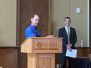 Dan Eberle thanking people after receiving an award from Patrick Sheehan at UW-Madison