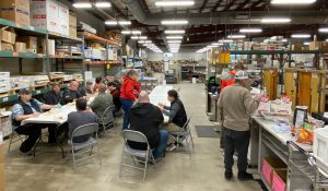 Employees enjoy a meal at the DPPS production center.