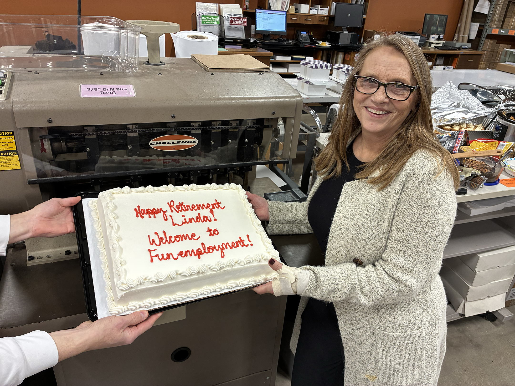Linda VonAllmen with her retirement cake.