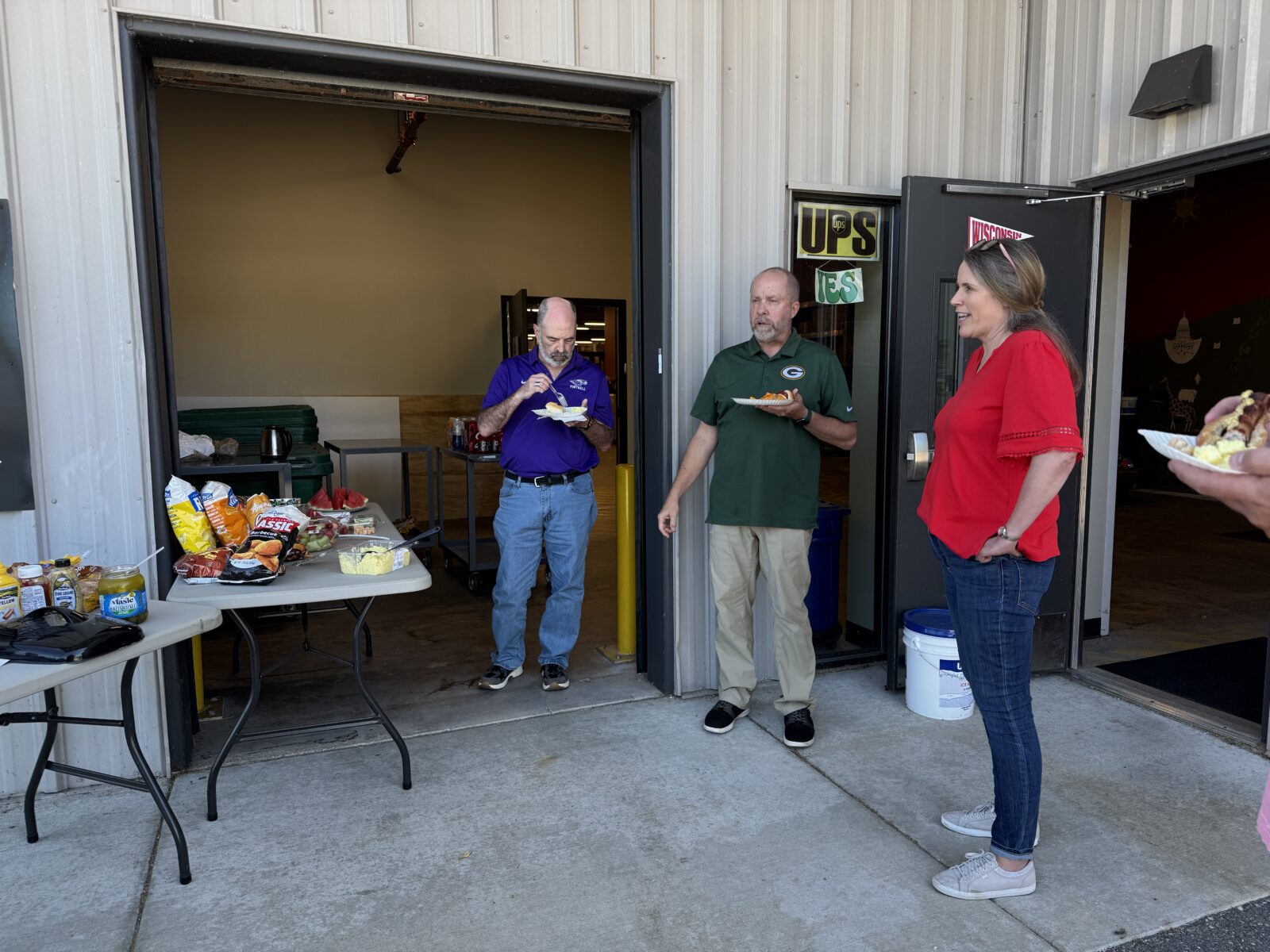 Tim, Ted, and Jenny chatting during our lunch event.